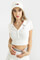 Bild von Geripptes Crop Poloshirt