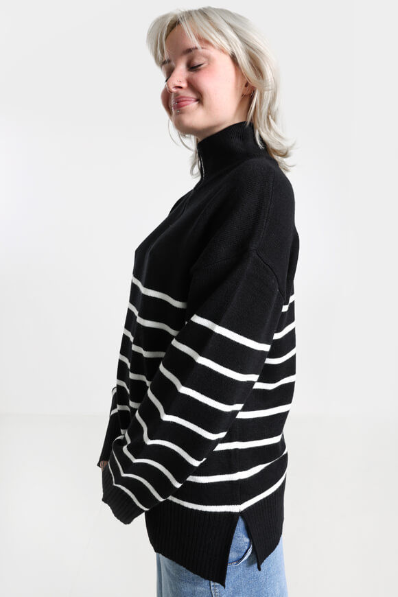 Bild von Langer Strickpullover